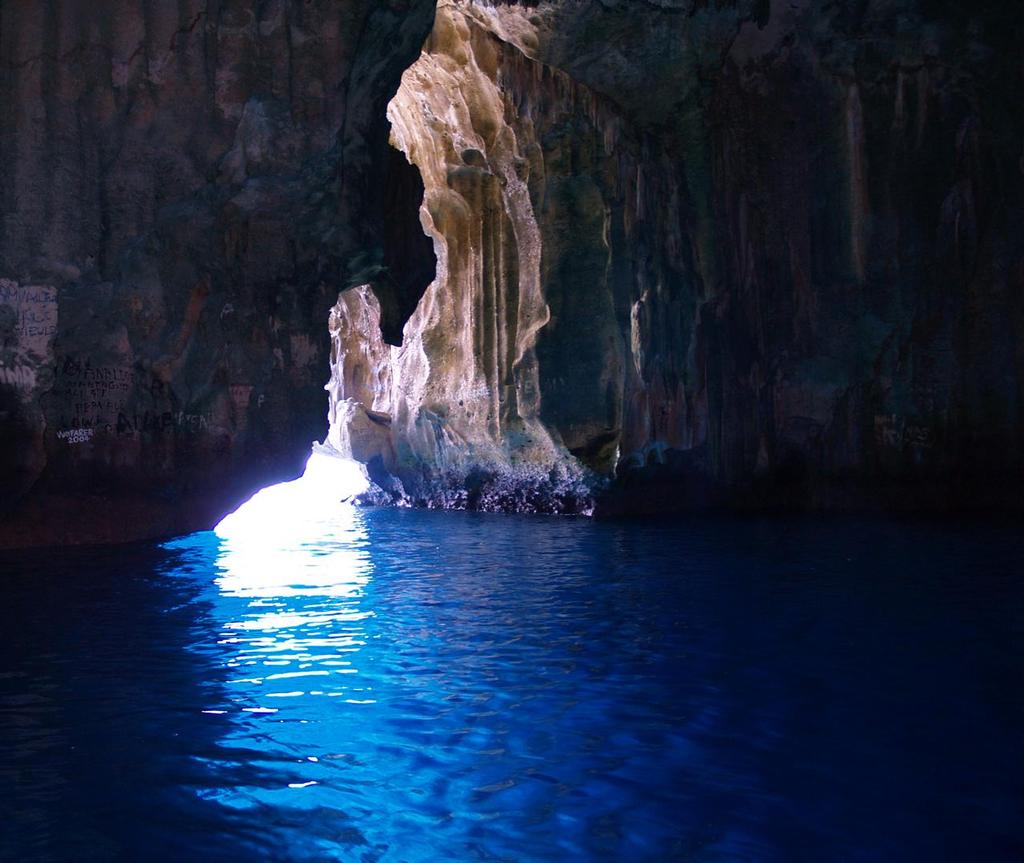 Swallow's Cave, a cavernous home for nesting swallows, can be explored by dingy. © Larry Macdonald